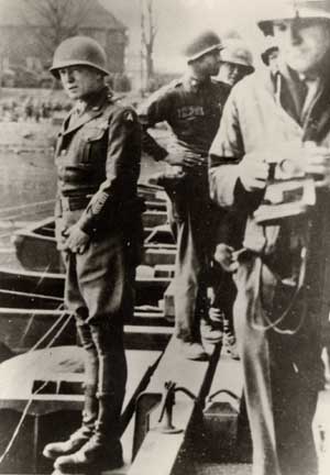 I drove to the Rhine River and went across on the pontoon bridge. I stopped in the middle to take a piss and then picked up some dirt on the far side in emulation of William the Conqueror. - General George S. Patton, March 1945_.jpg